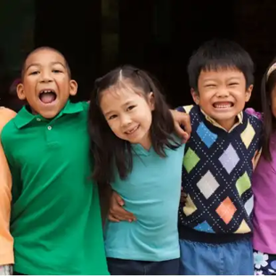 A group of children posing for a photo