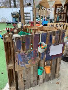 A wooden pallet with paint on it