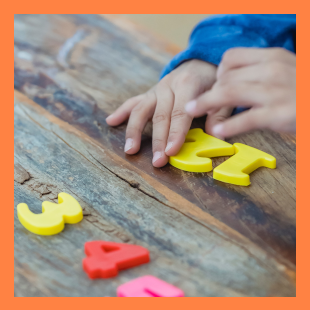 Orange Box and Child with Numbers