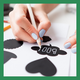 Green Box with Pencil and Paper