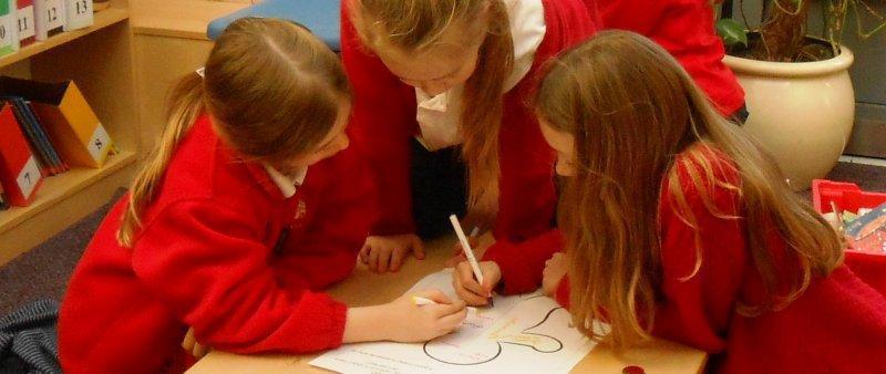 children drawing together